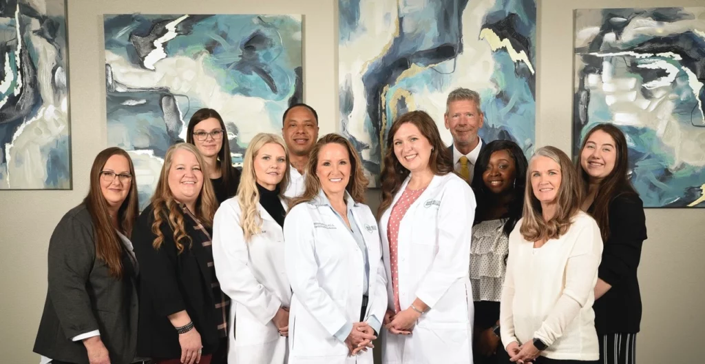 The staff of River Valley Medical Wellness poses together.