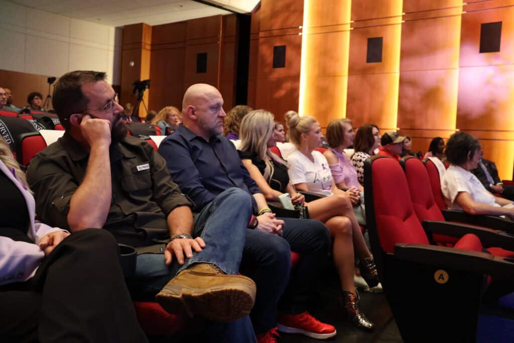 A full crowd watches the Hope Movement program.