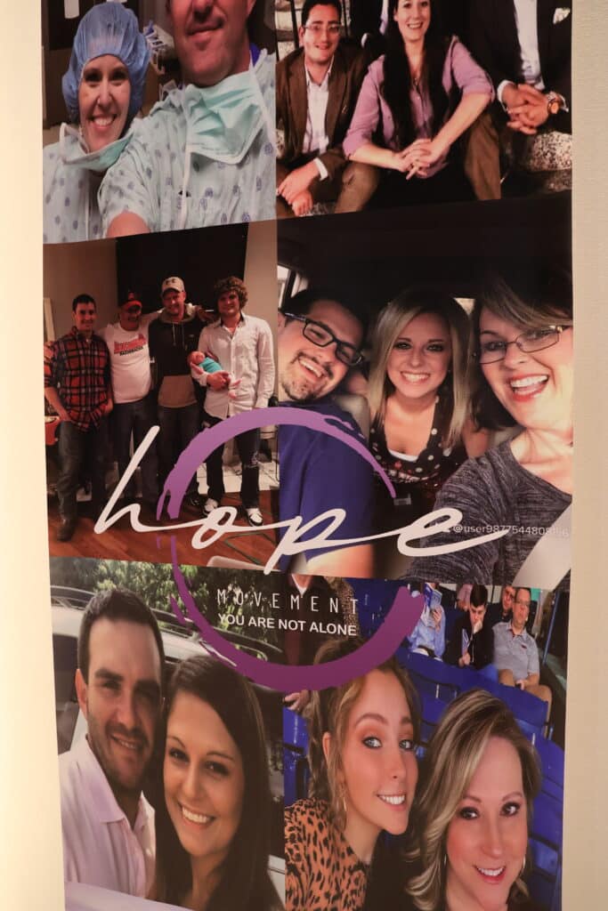 Hope Movement Banners are pictured, which have a collage of families which include photos of lost loved ones.